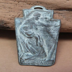 Antique Metal Belgium's Belgian Appeal Tag Nice Patina Baby Figural 1-3/8"  - Picture 1 of 4