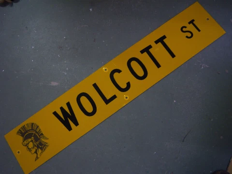 Vintage ORIGINAL WOLCOTT ST STREET SIGN 48" X 9" BLACK LETTERING ON YELLOW Cover