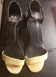 scarpe sandalo in pelle bicolore giallo e nero - Foto 1 di 4