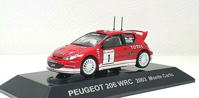 1/64 CM's 2003 PEUGEOT 206 WRC #1 GRONHOLM RALLY MONTE CARLO diecast car model  - Image 1 of 3