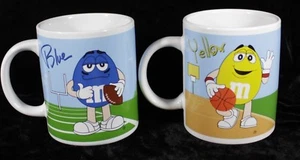M&M Coffee Mugs Red Golf Blue Football Green Baseball Yellow Basketball Set of 2 - Picture 1 of 12