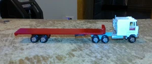1/64 ertl ford CL-9000 cabover massey-ferguson equipment + flatbed trailer used - Picture 1 of 7
