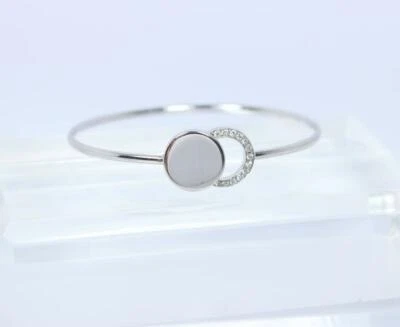 Sparkling 0.20CT Round Simulated Sapphire Features A Tension Closure Bracelets - Image 1 of 4