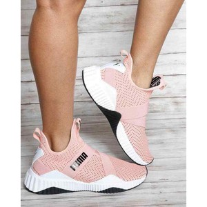 puma defy mid pink