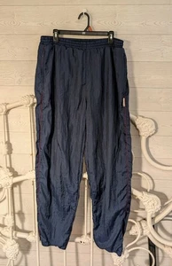 Pantalones deportivos Givenchy vintage para hombre forrados de nailon cortavientos años 90 L - Imagen 1 de 7