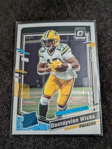 2023 Donruss Optic Rated Rookie #249 Dontayvion Wicks Packers Football Card - Bild 1 von 2
