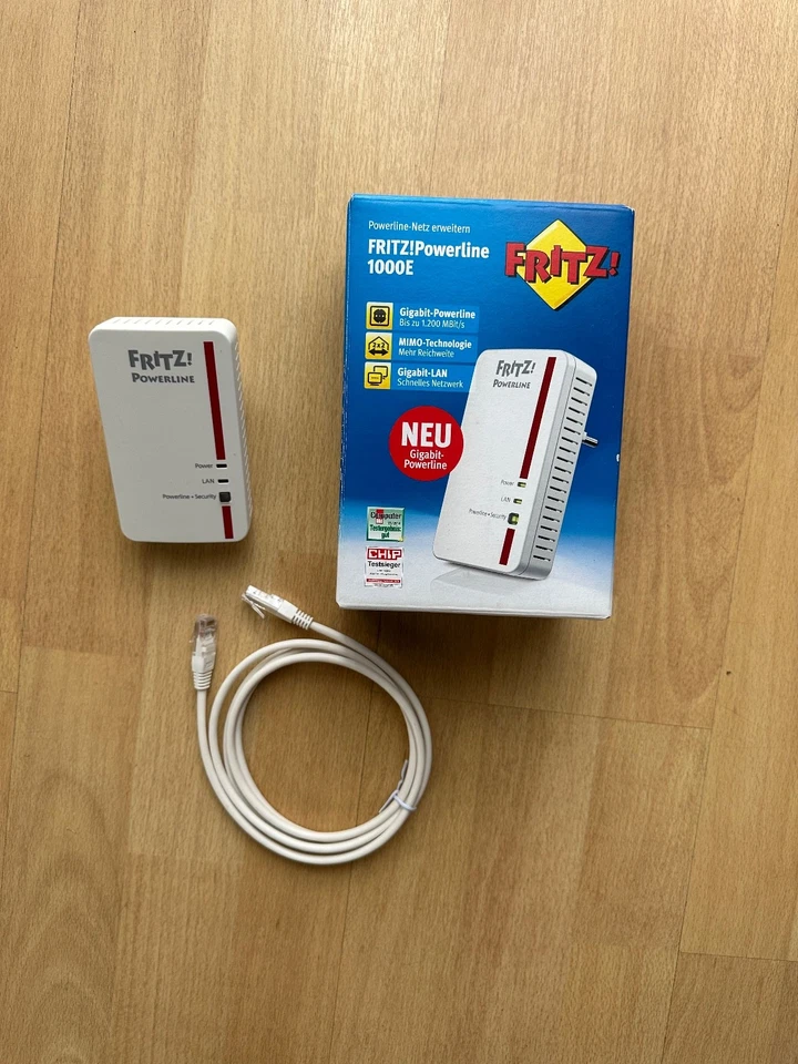 AVM FRITZ!Powerline 1000E Gigabit Netzwerk Adapter - 1200 Mbit/s - 1 LAN-Port - Bild 1 von 1