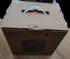 Neu - Xiaomi Smart Projector L1 - Mini Beamer - 1080p FHD Projektor Google TV - Bild 1 von 4