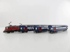 (RBT006) Fleischmann 734077 Zugset "LION" der SBB, Re 4/4 + 3 Doppelstockwage... - Bild 1 von 13