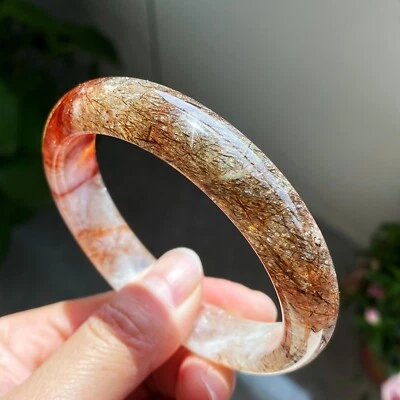 Brazalete de cristal de cuarzo Super 7 rutilado oro negro natural 60 mm AAAA Foto 1 de 4