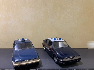 Burago 1/24 Alfa Romeo 75 Carabinieri + Alfa Romeo 75 Polizia Vintage  - Immagine 1 di 4