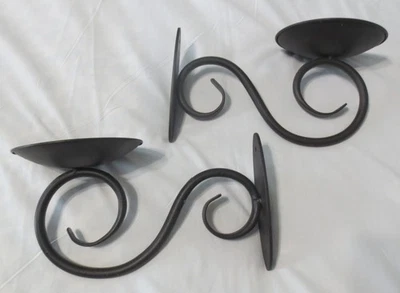 Par de apliques de vela de pared colgantes de metal de hierro forjado negro de colección Foto 1 de 4