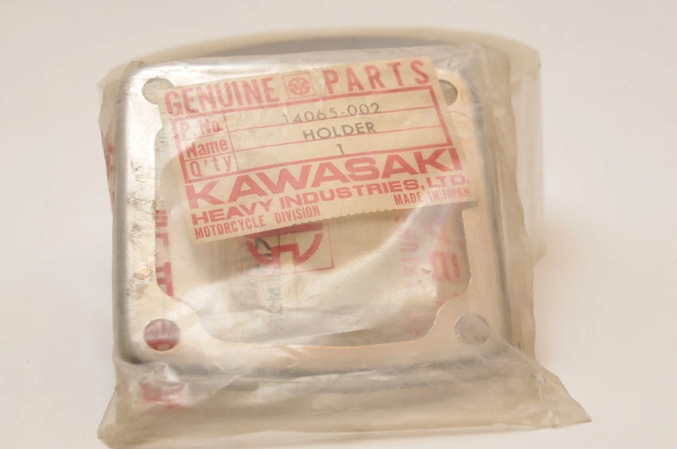 NUEVO Kawasaki NOS 14065-002 SOPORTE-TAPA CARBURADOR 1971-1975 F6 F7 71 72 73 74 75 Foto 1 de 1
