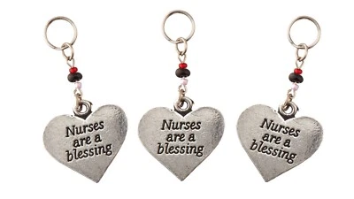 Paquete de 3 dijes llaveros en forma de corazón de enfermera joyas Foto 1 de 3