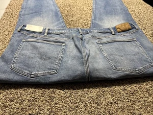 NWT AE AMERICAN EAGLE 42X32 ATHLETIC STRAIGHT AIRFLEX MENS JEANS - Picture 1 of 4