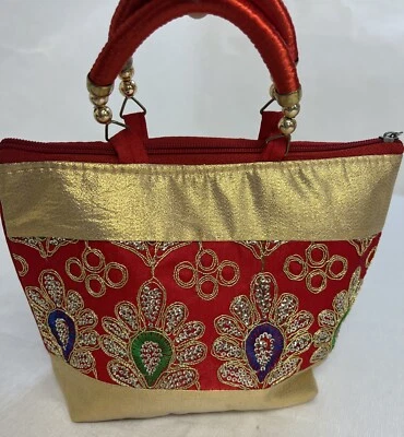 Bolso de mano para mujer indio hecho a mano con lentejuelas doradas bordado floral Foto 1 de 4