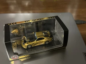 BM Creations Top Secret Toyota Supra GT-300 - Gold - Hong Kong Toycar Salon 1:64 - Bild 1 von 5