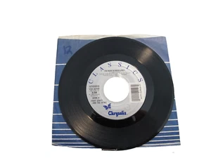 45 RECORD - HUEY LEWIS AND THE NEWS - THE HEART OF ROCK & ROLL - Picture 1 of 1