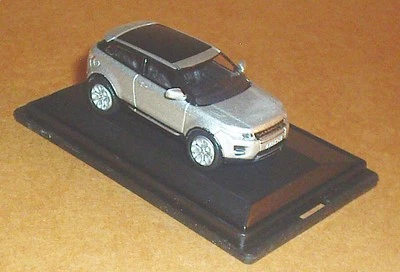 ЛИТАЯ СЕРЕБРИСТАЯ ДВУХДВЕРНАЯ МОДЕЛЬ АВТОМОБИЛЯ OXFORD RANGE ROVER EVOQUE INDUE МАСШТАБ 1:76  - Изображение 1 из 4