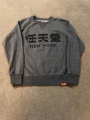 Suéter Pullover KANJI Nintendo New York Gris Talla Mediana Foto 1 de 4