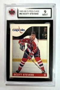 Scott Stevens 1985-86 O-Pee-Chee #62 | Calificado KSA Como Nuevo 9 - Imagen 1 de 2