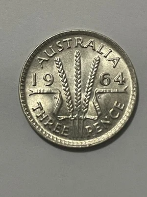 👀AUSTRALIAN 1964 THREEPENCE SILVER COIN HIGH GRADE GEM UNC SCARCE THUS 👀 - Image 1 of 2