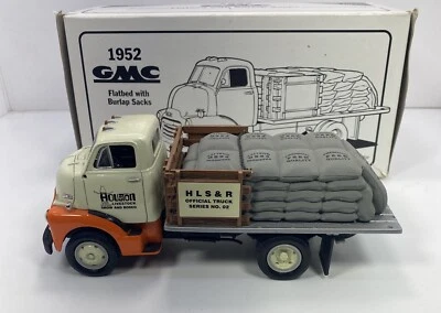 FIRST GEAR 1/34 Scale 1952 GMC Flatbed W/BURLAP SACKS”Houston Livestock Show” - Image 1 of 4