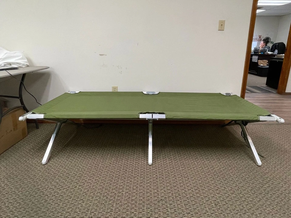 US Military Issue Compact Lightweight Foldable Aluminum Sleeping Cot - New - Image 1 of 4