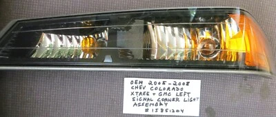 Luz de esquina de señal de conductor izquierdo OEM 2005-2008 Chevrolet Colorado + GMC Xtreme Foto 1 de 4