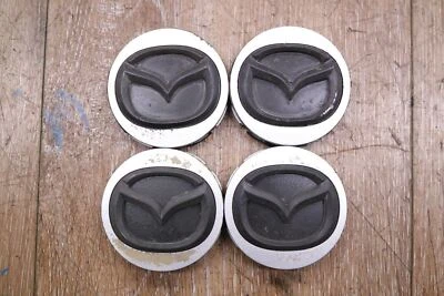 06-15 Juego de 4 tapas centrales de rueda OEM Mazda Miata MX-5 Foto 1 de 4