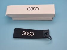 Produktbild - Original Audi Sport Schlüsselanhänger schwarz/weiß in Schlaufenform ca. 12x3cm