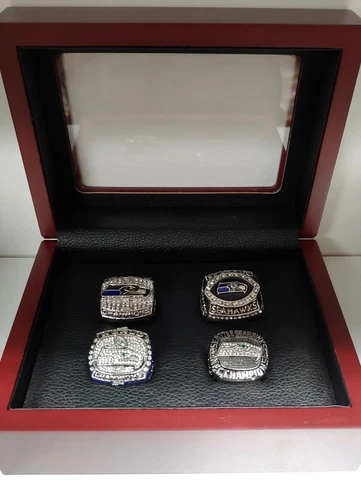 Seattle Seahawks - Championship Super Bowl 4 Ring Set With Wooden Box. Wilson Cover