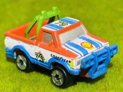 Micro Machines Shell Oil Datsun 720 4x4 #79 Goodyear Red White Blue Livery - Image 1 of 4