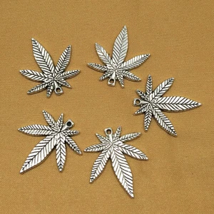 Wholesale Bulk Antique Silver Plated Marijuana Leaf Weed Charm Pendants - Picture 1 of 3