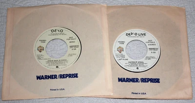 DEVO (2x 7" 45 Mono/Stereo Promo) Jerkin' Back 'n' Forth / Gates of Steel Live - Image 1 of 2