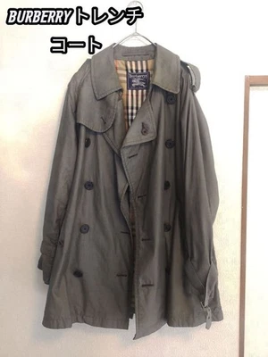 Gabardina Burberry gris cinturón sin razón Foto 1 de 4