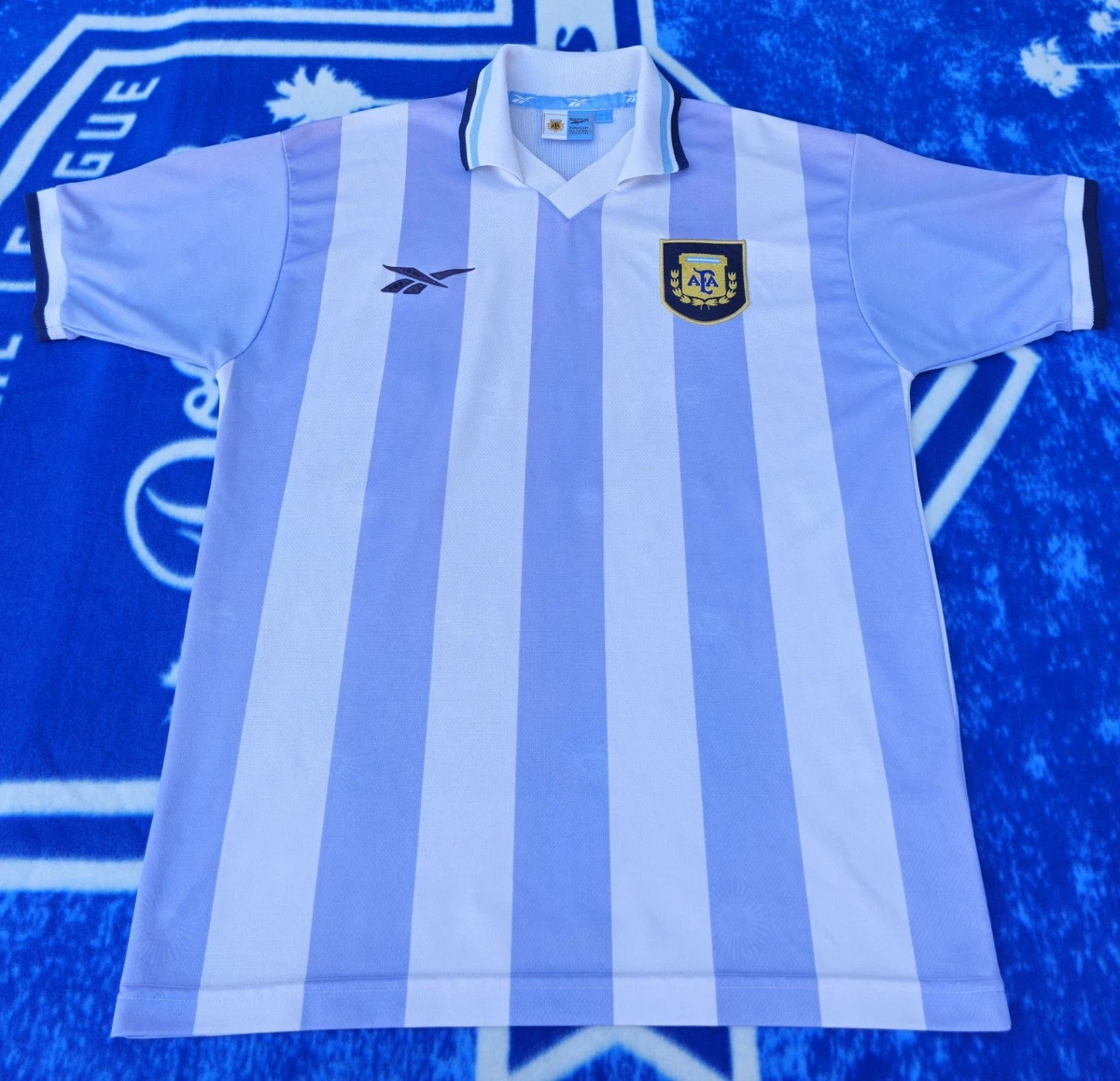 Preços baixos em Equipe Nacional Reebok Argentina Roupas e