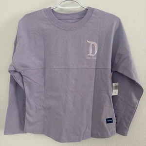 Disney Spirit Trikot Disneyland lila irisierend Kinder Größe L (11/12) - Bild 1 von 3