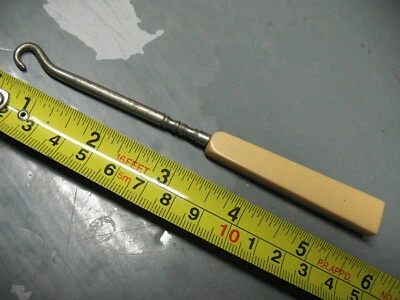 ANTIQUE  FRENCH  IVORY  BUTTON  CORSET  HOOK  ART   DECO  - Image 1 of 3