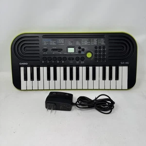 CASIO Mini Keyboard SA-46 Black & Green 32 Keys 100 Tones 50 Patterns Tested - Picture 1 of 10