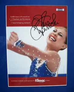 Photo dédicacée Tara Lipinski 2002 patinage artistique olympique encadrée 14x16 publicité Kleenex - Photo 1/6