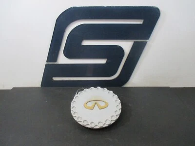 Infiniti J30 1995 - Tapa central de llanta de fábrica (defecto: arañazos y desgaste) Foto 1 de 4