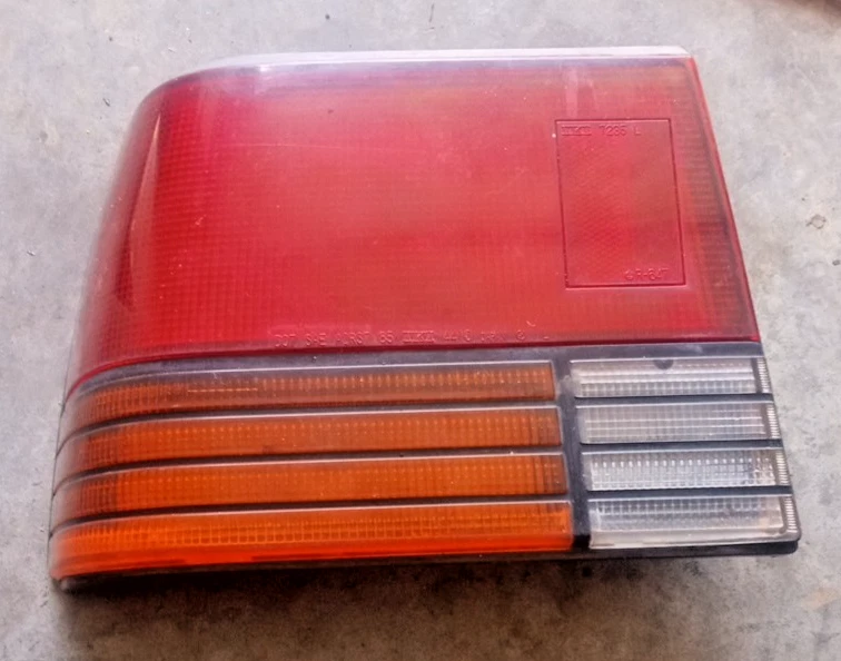 Luz trasera izquierda conductor Chevrolet Spectrum 1985-86 OEM, 166-58105A LOC-171DG Foto 1 de 4