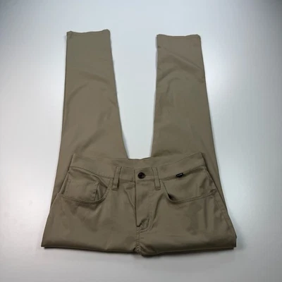 Pantalones de golf Travis Mathew para hombre 30x32 marrón frente plano ligeros elásticos Foto 1 de 4