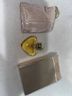 NUEVO EN CAJA AVON HEARTSTRINGS EN BOLSA CON CORDÓN PERFUME ARIANE .18 fl oz Foto 1 de 3