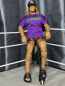 Matt Riddle - Elite 99 con camisa, scooter, chanclas y sombrero WWE Mattel AE... - Imagen 1 de 4