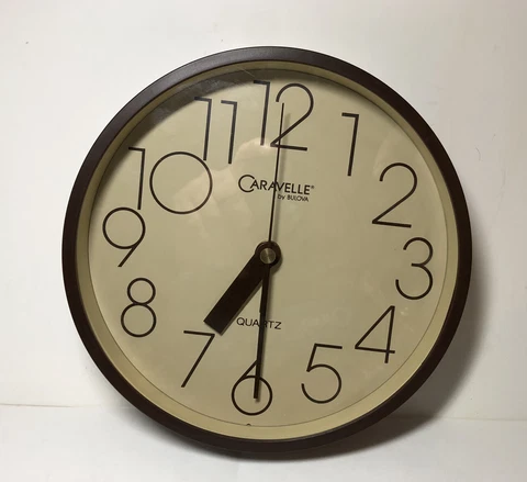Caravelle by Bulova wall clock Cover