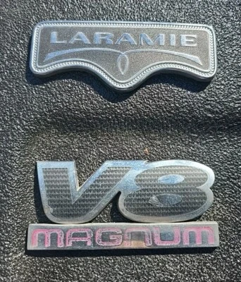 2005-2011 DODGE DAKOTA Laramie & V8 Magnum Emblems / Badges OEM MOPAR 55078057AA - Image 1 of 3