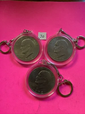 Junk Drawer Lot 3 Eisenhower Silver Dollars Type Ike Keychains Coin Sets Look - Image 1 of 3