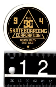 DC Shoe Company Skateboard Sticker 2.5 in Round Black/Gold Snowboard Decal - Picture 1 of 1